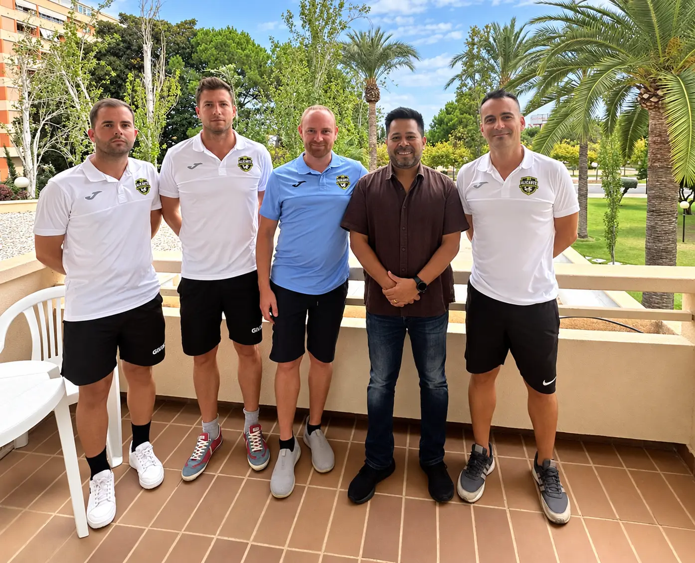 Xdrona coaching staff and an agent at a partner academy in Spain.