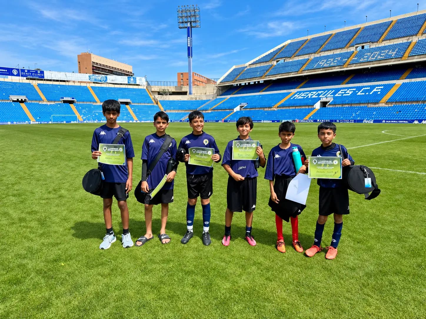 Young footballers on a pitch during a development trip.
